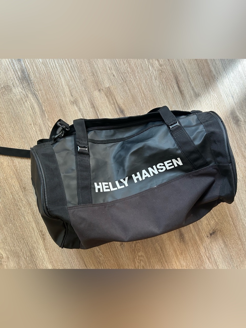 Helly Hansen Duffle Bag 30L, converts to backpack. Waterproof, soft, material